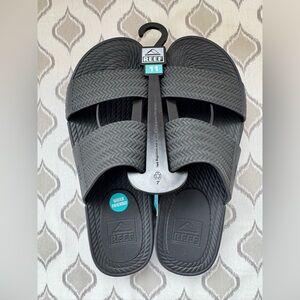 Reef Black Textured Slip-On Sandals
